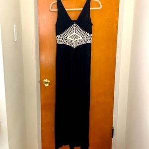 S Cable & Gauge V-neck black maxi dress with crochet waist detail.